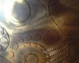 Another close-up of the artwork focusing on circular patterns.