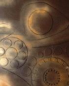 Third close-up showing a different angle of the metallic details.