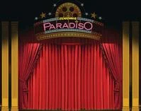 A stage with a red curtain and a sign that reads Cinema Paradiso