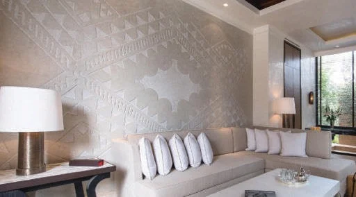 Luxury hotel room interior with a large sofa