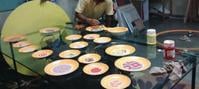 A person working on plates